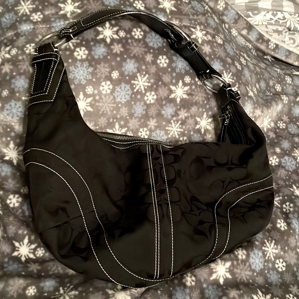 Coach hobo bag with matching wallet.